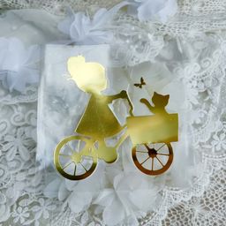 Дівчинка на велосепеді - вирубка із термотрансферної плівки - зеркальне жовте золото